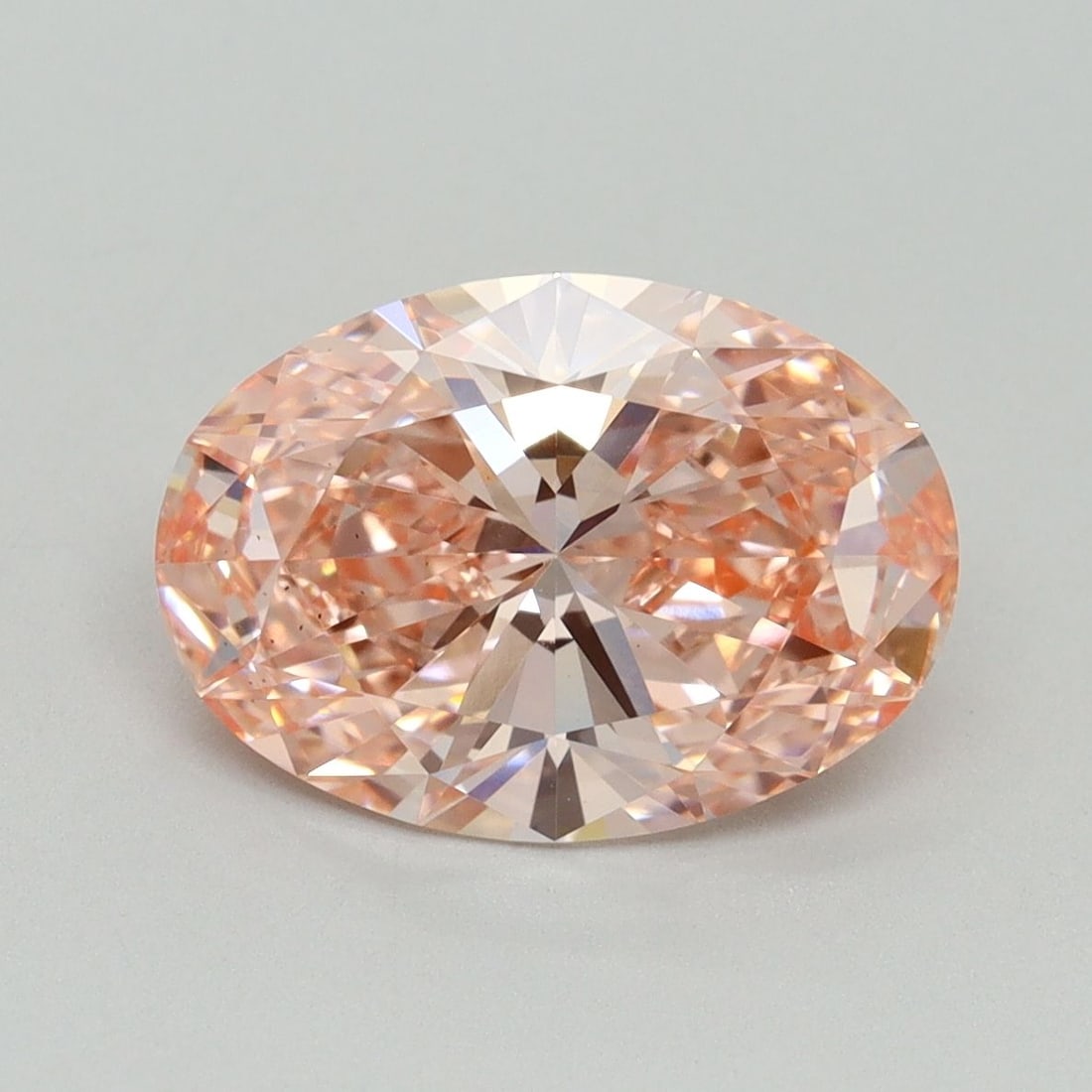 Loose Diamond - OVAL 3.01ct Fancy Vivid Pink VS2: Loose Diamond - OVAL 3.01ct Fancy Vivid Pink VS2 Source: This is a real non-mined Diamond that has been grown in a lab Shape: OVAL Carats: 3.01 Color: Fancy Vivid Pink Certification: IGI Video: