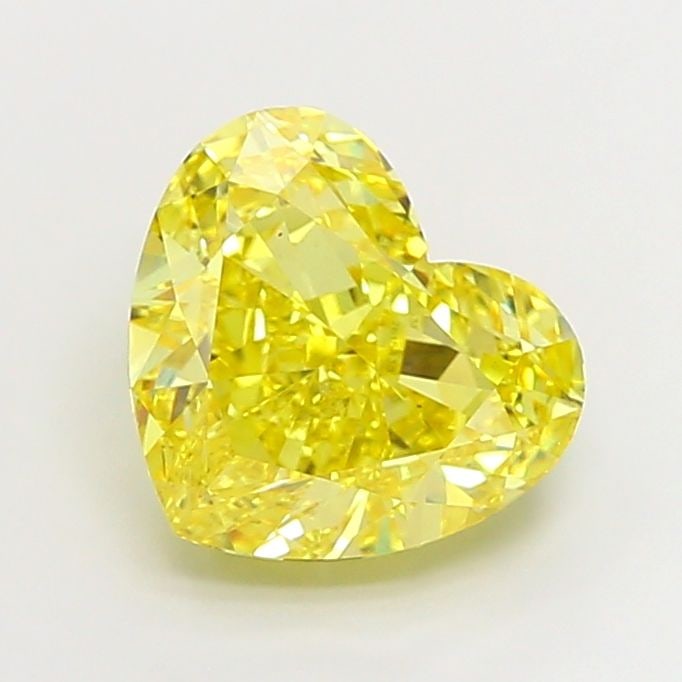 Loose Diamond - HEART 7.02ct Fancy Vivid Yellow VS2: Loose Diamond - HEART 7.02ct Fancy Vivid Yellow VS2 Source: This is a real non-mined Diamond that has been grown in a lab Shape: HEART Carats: 7.02 Color: Fancy Vivid Yellow Certification: IGI Video:
