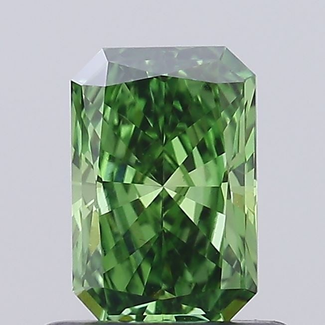 Loose Diamond - RADIANT 0.71ct Fancy Vivid Green VVS2: Loose Diamond - RADIANT 0.71ct Fancy Vivid Green VVS2 Source: This is a real non-mined Diamond that has been grown in a lab Shape: RADIANT Carats: 0.71 Color: Fancy Vivid Green Certification: IGI Vide