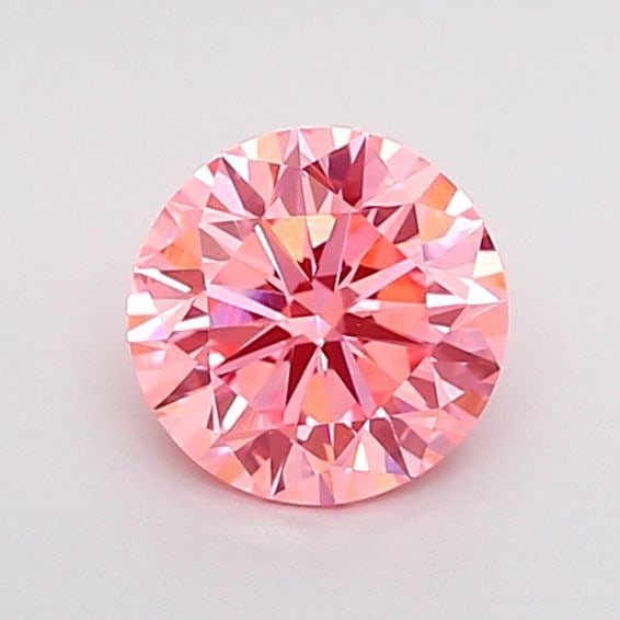 Loose Diamond - ROUND 0.74ct Fancy Vivid Pink VVS2: Loose Diamond - ROUND 0.74ct Fancy Vivid Pink VVS2 Source: This is a real non-mined Diamond that has been grown in a lab Shape: ROUND Carats: 0.74 Color: Fancy Vivid Pink Certification: IGI Video: