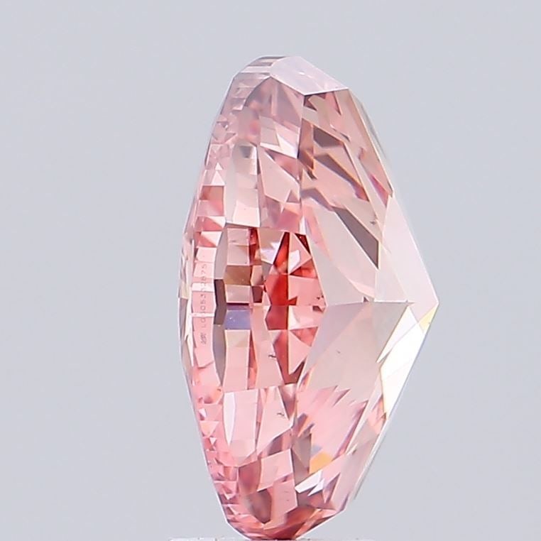 Loose Diamond - OVAL 7.01ct Fancy Vivid Pink VS1: Loose Diamond - OVAL 7.01ct Fancy Vivid Pink VS1 Source: This is a real non-mined Diamond that has been grown in a lab Shape: OVAL Carats: 7.01 Color: Fancy Vivid Pink Certification: IGI Video: