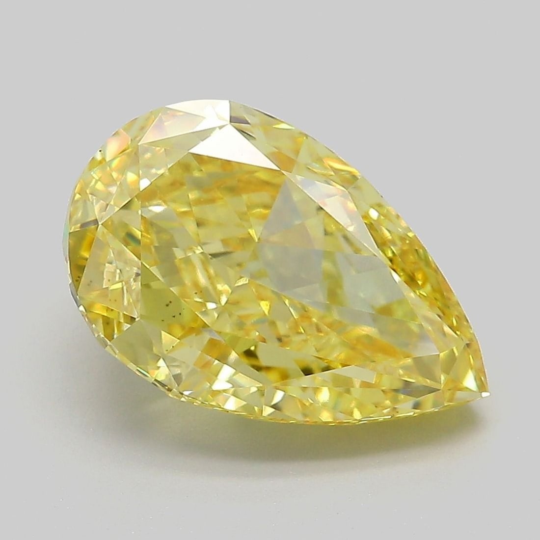 Loose Diamond - PEAR 5.05ct Fancy Vivid Yellow VS2: Loose Diamond - PEAR 5.05ct Fancy Vivid Yellow VS2 Source: This is a real non-mined Diamond that has been grown in a lab Shape: PEAR Carats: 5.05 Color: Fancy Vivid Yellow Certification: IGI Video: