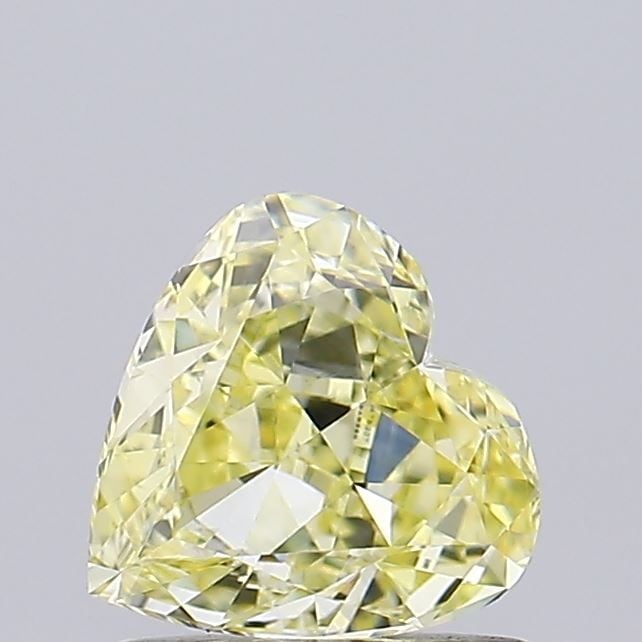 Loose Diamond - HEART 1.02ct Fancy Intense Yellow VS1: Loose Diamond - HEART 1.02ct Fancy Intense Yellow VS1 Source: This is a real non-mined Diamond that has been grown in a lab Shape: HEART Carats: 1.02 Color: Fancy Intense Yellow Certification: IGI Vid