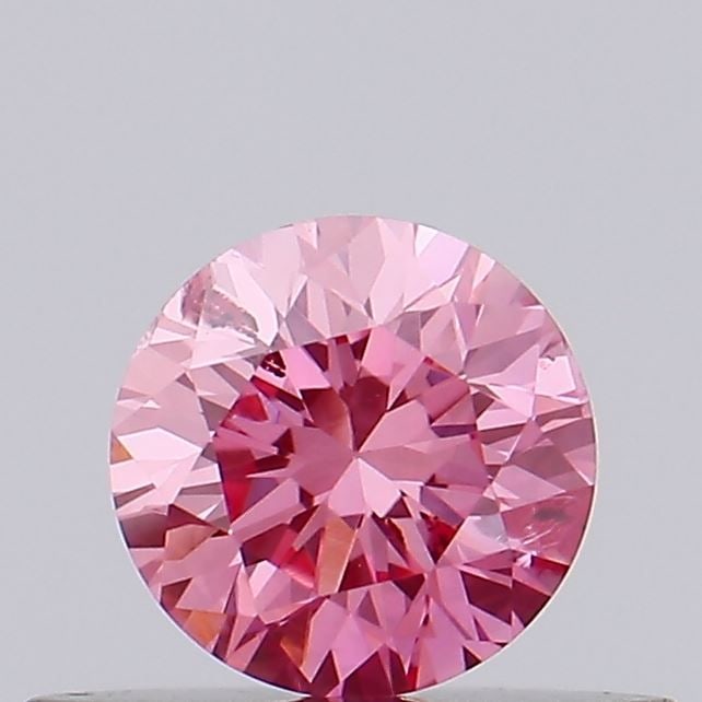 Loose Diamond - ROUND 0.31ct Fancy Vivid Pink SI2: Loose Diamond - ROUND 0.31ct Fancy Vivid Pink SI2 Source: This is a real non-mined Diamond that has been grown in a lab Shape: ROUND Carats: 0.31 Color: Fancy Vivid Pink Certification: IGI Video: