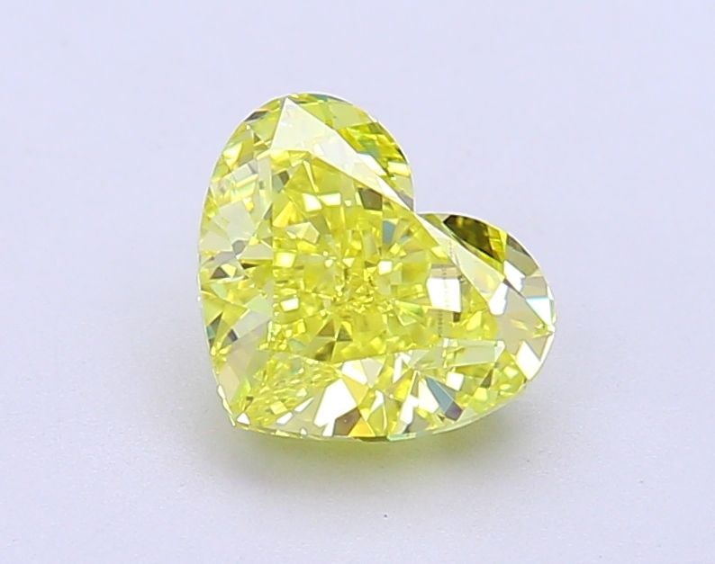 Loose Diamond - HEART 1.53ct Fancy Vivid Yellow VVS2: Loose Diamond - HEART 1.53ct Fancy Vivid Yellow VVS2 Source: This is a real non-mined Diamond that has been grown in a lab Shape: HEART Carats: 1.53 Color: Fancy Vivid Yellow Certification: IGI Video: