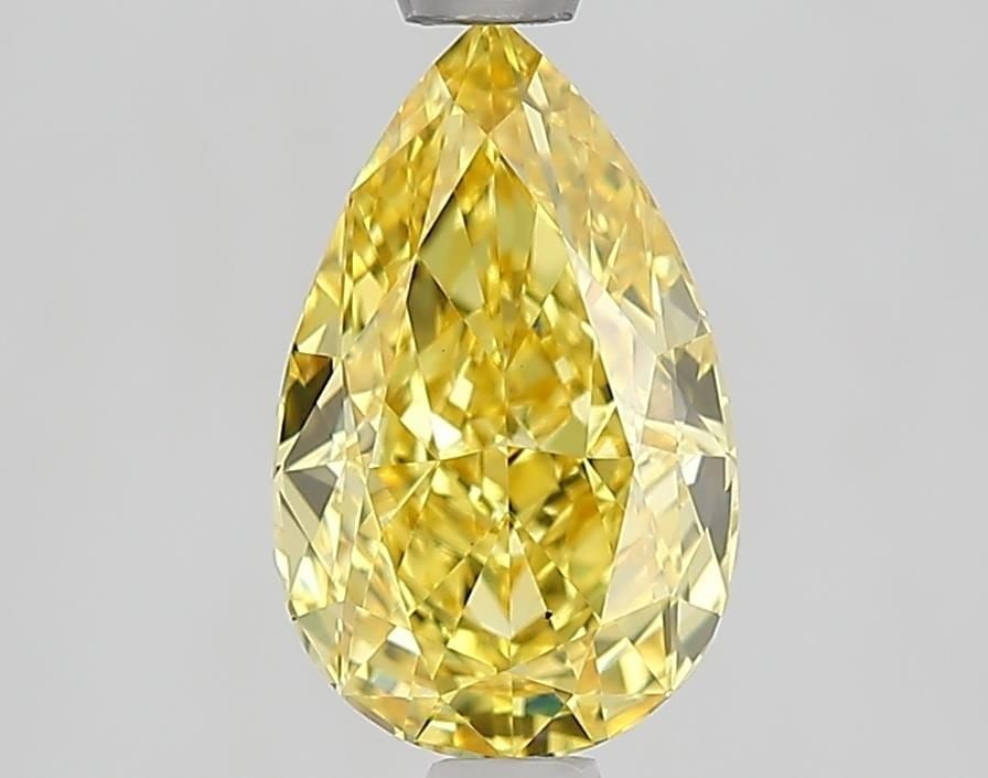 Loose Diamond - PEAR 1.55ct Fancy Vivid Yellow VS2: Loose Diamond - PEAR 1.55ct Fancy Vivid Yellow VS2 Source: This is a real non-mined Diamond that has been grown in a lab Shape: PEAR Carats: 1.55 Color: Fancy Vivid Yellow Certification: IGI Video: