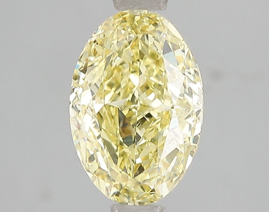 Loose Diamond - OVAL 1.99ct Fancy Intense Yellow VS2: Loose Diamond - OVAL 1.99ct Fancy Intense Yellow VS2 Source: This is a real non-mined Diamond that has been grown in a lab Shape: OVAL Carats: 1.99 Color: Fancy Intense Yellow Certification: IGI Video