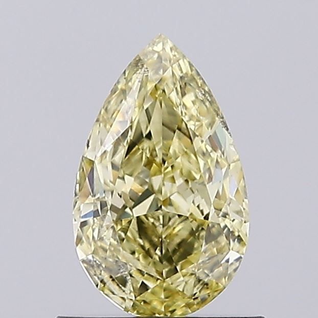 Loose Diamond - PEAR 0.92ct Fancy Intense Yellow SI1: Loose Diamond - PEAR 0.92ct Fancy Intense Yellow SI1 Source: This is a real non-mined Diamond that has been grown in a lab Shape: PEAR Carats: 0.92 Color: Fancy Intense Yellow Certification: IGI Video