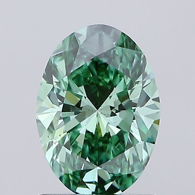 Loose Diamond - OVAL 1.01ct Fancy Vivid Green VS2: Loose Diamond - OVAL 1.01ct Fancy Vivid Green VS2 Source: This is a real non-mined Diamond that has been grown in a lab Shape: OVAL Carats: 1.01 Color: Fancy Vivid Green Certification: IGI Video: