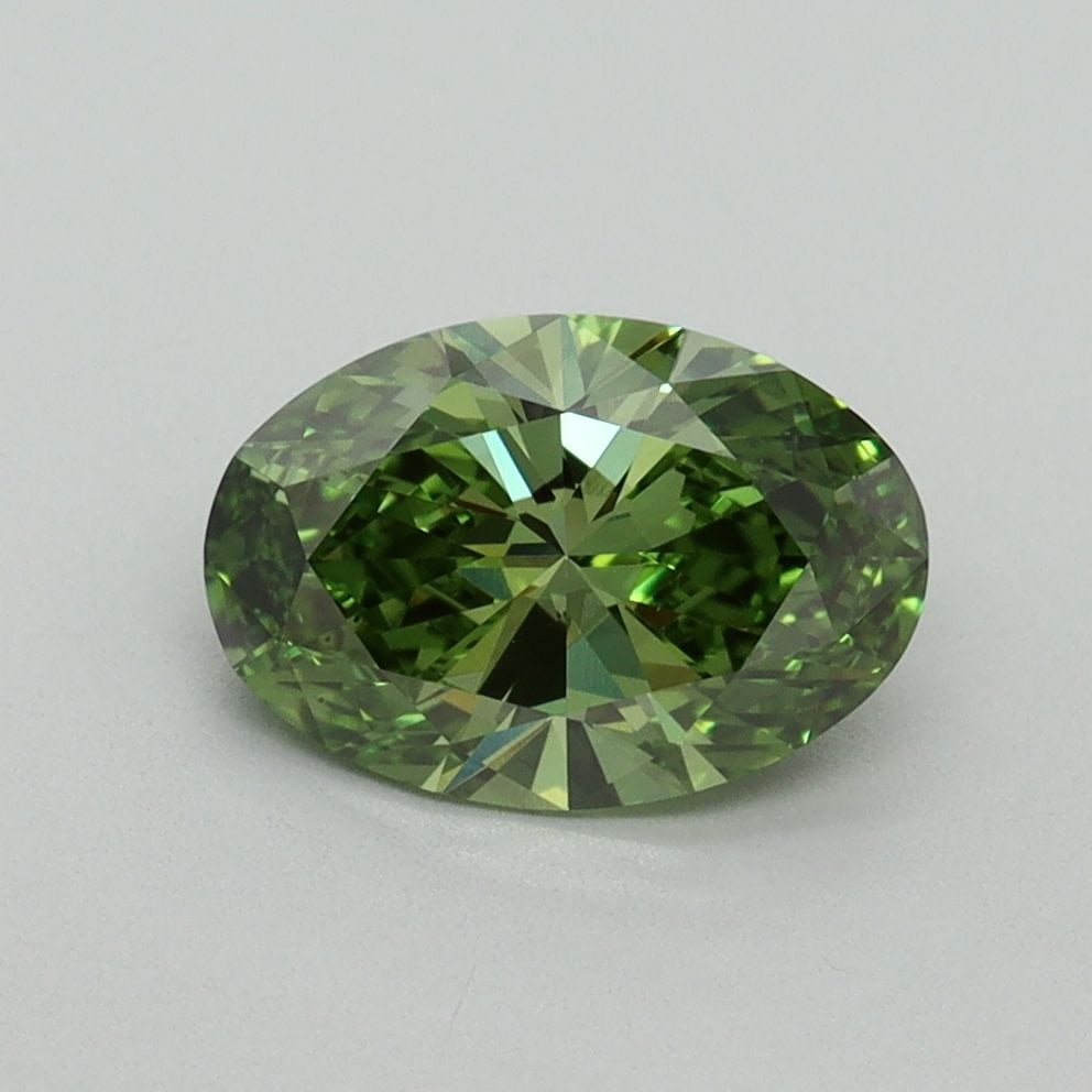 Loose Diamond - OVAL 1.23ct Fancy Vivid Green VS2: Loose Diamond - OVAL 1.23ct Fancy Vivid Green VS2 Source: This is a real non-mined Diamond that has been grown in a lab Shape: OVAL Carats: 1.23 Color: Fancy Vivid Green Certification: IGI Video: