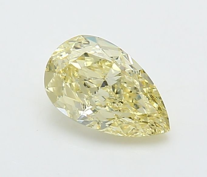 Loose Diamond - PEAR 0.9ct Fancy Yellow VVS2: Loose Diamond - PEAR 0.9ct Fancy Yellow VVS2 Source: This is a real non-mined Diamond that has been grown in a lab Shape: PEAR Carats: 0.9 Color: Fancy Yellow Certification: IGI Video: