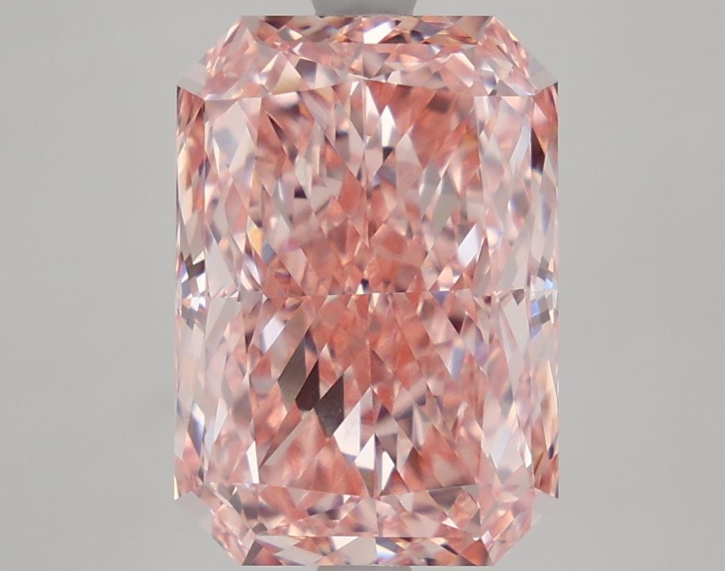 Loose Diamond - RADIANT 5.69ct Fancy Vivid Pink VVS2: Loose Diamond - RADIANT 5.69ct Fancy Vivid Pink VVS2 Source: This is a real non-mined Diamond that has been grown in a lab Shape: RADIANT Carats: 5.69 Color: Fancy Vivid Pink Certification: IGI Video: