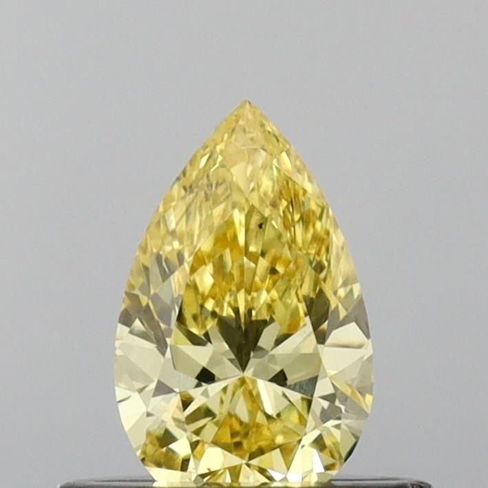 Loose Diamond - PEAR 0.42ct Fancy Vivid Yellow VS2: Loose Diamond - PEAR 0.42ct Fancy Vivid Yellow VS2 Source: This is a real non-mined Diamond that has been grown in a lab Shape: PEAR Carats: 0.42 Color: Fancy Vivid Yellow Certification: IGI Video: