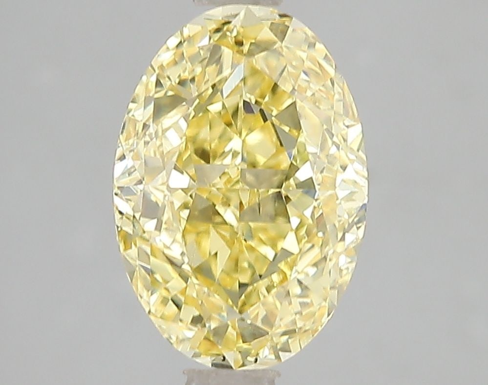 Loose Diamond - OVAL 3.02ct Fancy Vivid Yellow VS2: Loose Diamond - OVAL 3.02ct Fancy Vivid Yellow VS2 Source: This is a real non-mined Diamond that has been grown in a lab Shape: OVAL Carats: 3.02 Color: Fancy Vivid Yellow Certification: IGI Video: