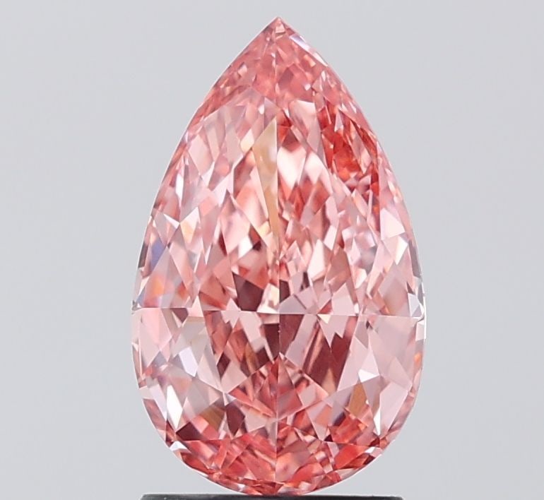 Loose Diamond - PEAR 2.03ct Fancy Vivid Pink VS2: Loose Diamond - PEAR 2.03ct Fancy Vivid Pink VS2 Source: This is a real non-mined Diamond that has been grown in a lab Shape: PEAR Carats: 2.03 Color: Fancy Vivid Pink Certification: IGI Video: