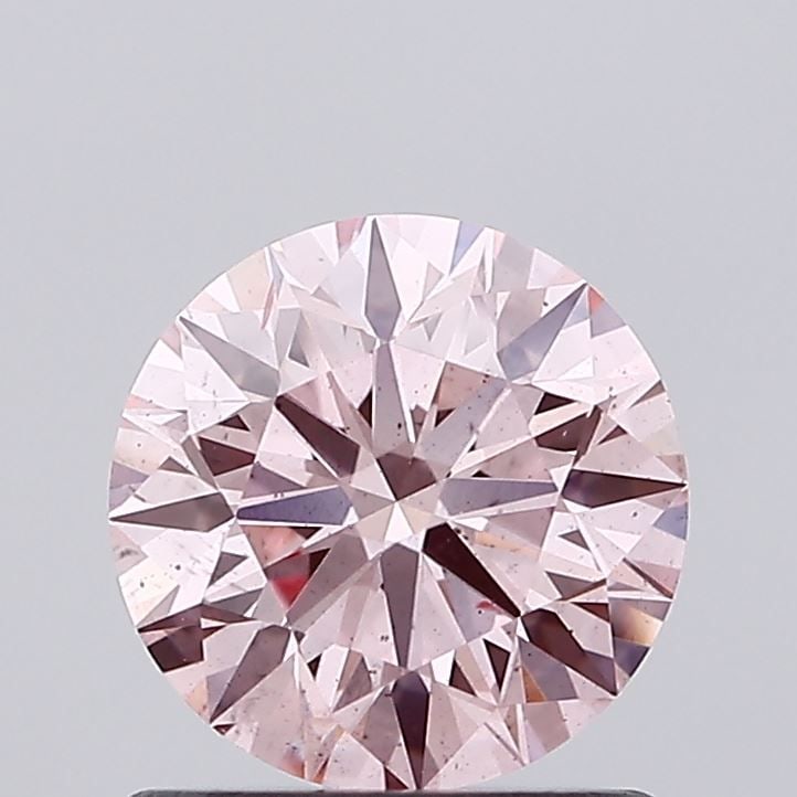 Ideal Loose Diamond - ROUND 1.02ct Fancy Vivid Pink SI2: Ideal Loose Diamond - ROUND 1.02ct Fancy Vivid Pink SI2 Source: This is a real non-mined Diamond that has been grown in a lab Shape: ROUND Carats: 1.02 Color: Fancy Vivid Pink Certification: IGI Video