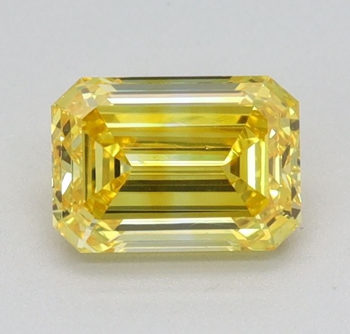 Loose Diamond - EMERALD 0.63ct Fancy Vivid Yellow VS1: Loose Diamond - EMERALD 0.63ct Fancy Vivid Yellow VS1 Source: This is a real non-mined Diamond that has been grown in a lab Shape: EMERALD Carats: 0.63 Color: Fancy Vivid Yellow Certification: IGI Vid
