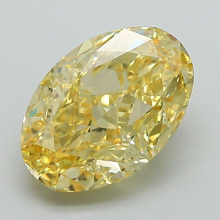 Loose Diamond - OVAL 3.07ct Fancy Vivid Yellow VVS2: Loose Diamond - OVAL 3.07ct Fancy Vivid Yellow VVS2 Source: This is a real non-mined Diamond that has been grown in a lab Shape: OVAL Carats: 3.07 Color: Fancy Vivid Yellow Certification: IGI Video: