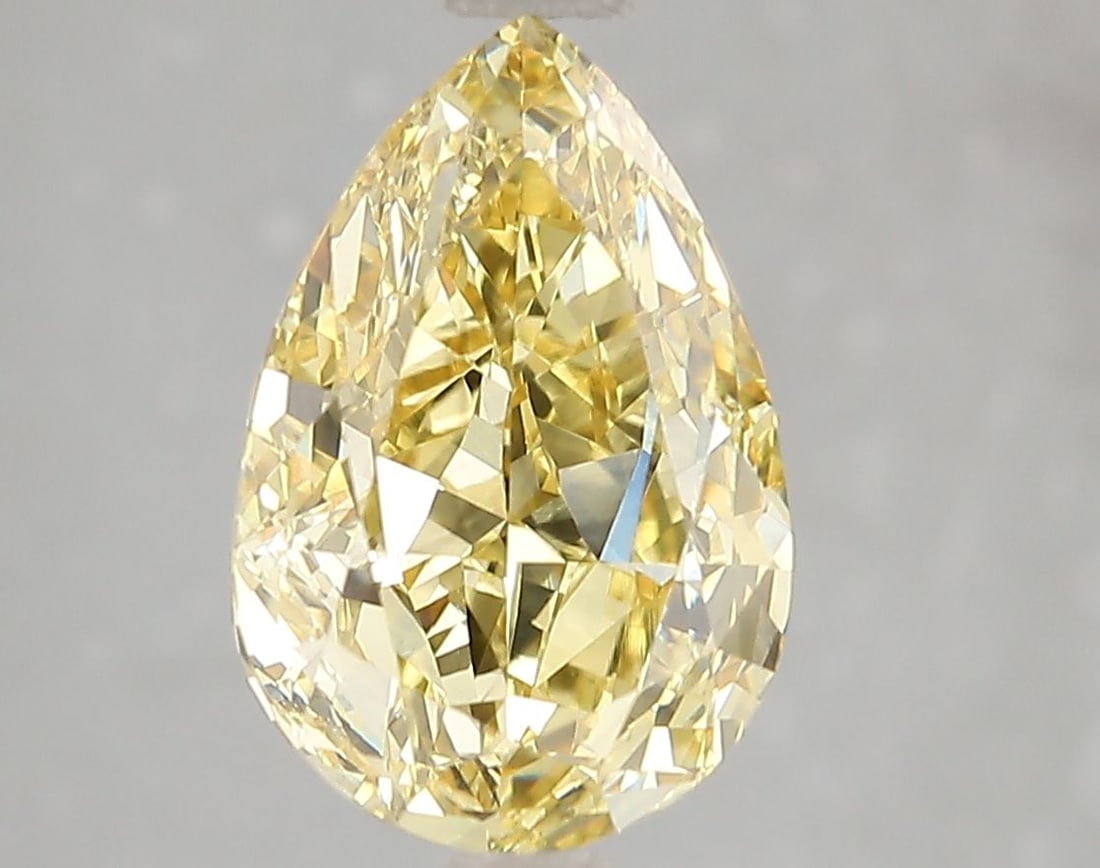 Loose Diamond - PEAR 3.51ct Fancy Vivid Yellow VS2: Loose Diamond - PEAR 3.51ct Fancy Vivid Yellow VS2 Source: This is a real non-mined Diamond that has been grown in a lab Shape: PEAR Carats: 3.51 Color: Fancy Vivid Yellow Certification: IGI Video: