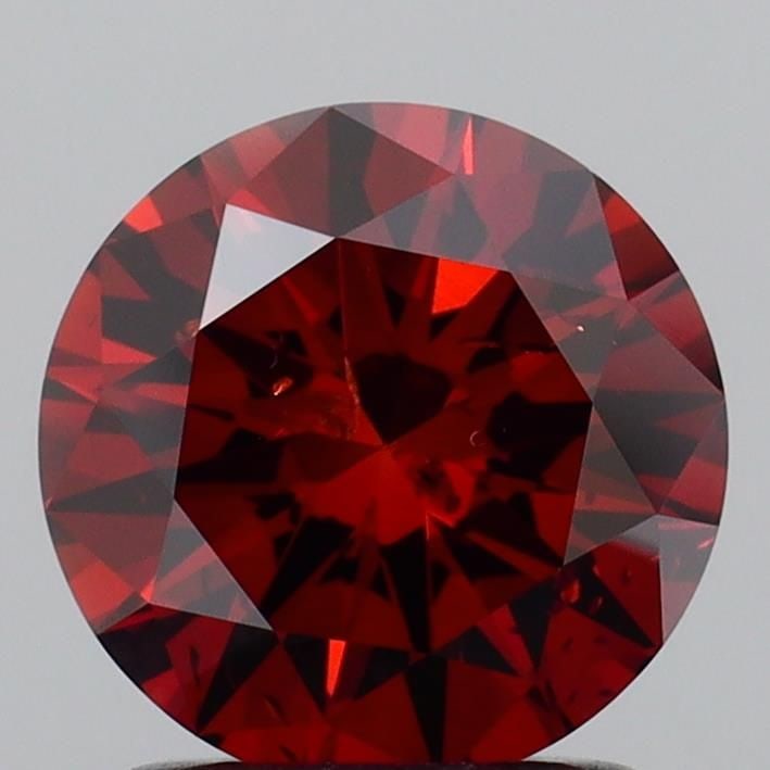 Loose Diamond - ROUND 1.34ct Fancy Deep Orange SI2: Loose Diamond - ROUND 1.34ct Fancy Deep Orange SI2 Source: This is a real non-mined Diamond that has been grown in a lab Shape: ROUND Carats: 1.34 Color: Fancy Deep Orange Certification: IGI Video: