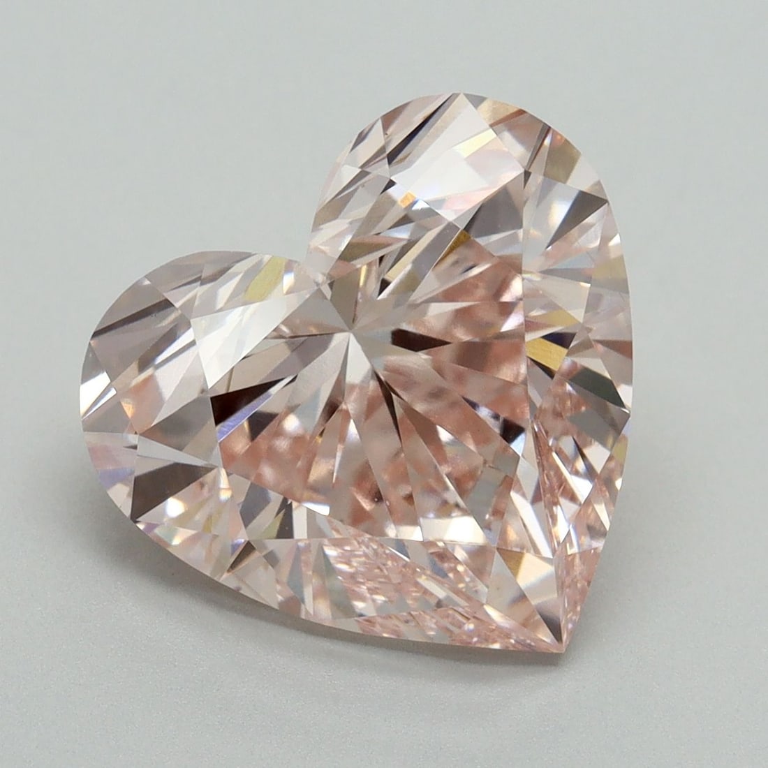 Loose Diamond - HEART 6.57ct Fancy Pink VVS2: Loose Diamond - HEART 6.57ct Fancy Pink VVS2 Source: This is a real non-mined Diamond that has been grown in a lab Shape: HEART Carats: 6.57 Color: Fancy Pink Certification: IGI Video: