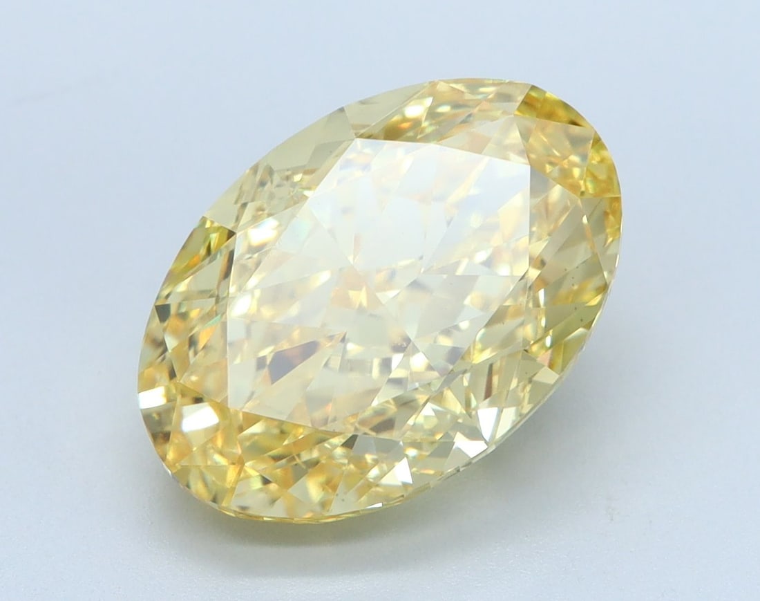Loose Diamond - OVAL 5.03ct Fancy Vivid Yellow VS1: Loose Diamond - OVAL 5.03ct Fancy Vivid Yellow VS1 Source: This is a real non-mined Diamond that has been grown in a lab Shape: OVAL Carats: 5.03 Color: Fancy Vivid Yellow Certification: IGI Video: