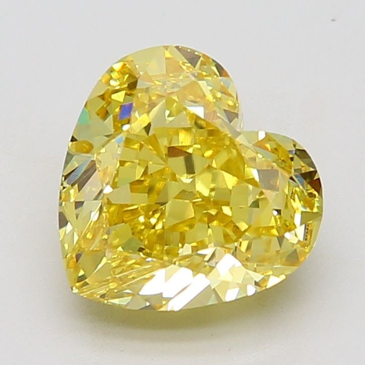 Loose Diamond - HEART 6.53ct Fancy Vivid Yellow VVS2: Loose Diamond - HEART 6.53ct Fancy Vivid Yellow VVS2 Source: This is a real non-mined Diamond that has been grown in a lab Shape: HEART Carats: 6.53 Color: Fancy Vivid Yellow Certification: IGI Video: