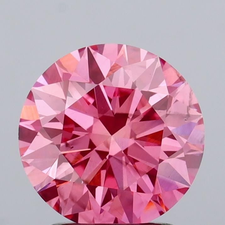 Ideal Loose Diamond - ROUND 2.0ct Fancy Vivid Pink SI1: Ideal Loose Diamond - ROUND 2.0ct Fancy Vivid Pink SI1 Source: This is a real non-mined Diamond that has been grown in a lab Shape: ROUND Carats: 2.0 Color: Fancy Vivid Pink Certification: IGI Video: