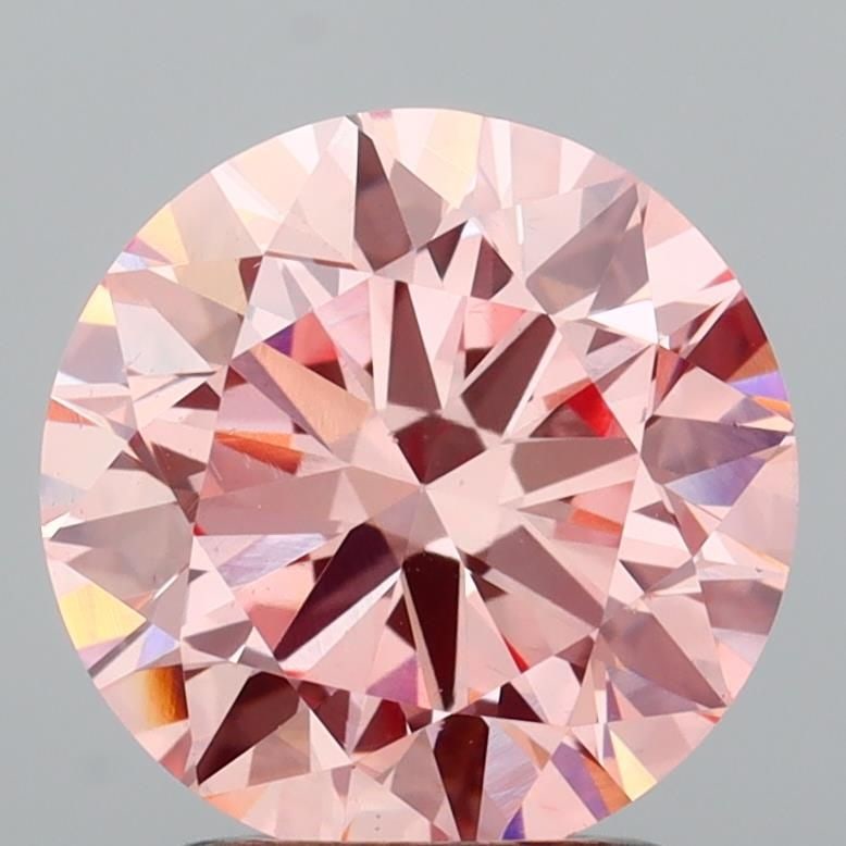 Ideal Loose Diamond - ROUND 2.21ct Fancy Vivid Pink VS1: Ideal Loose Diamond - ROUND 2.21ct Fancy Vivid Pink VS1 Source: This is a real non-mined Diamond that has been grown in a lab Shape: ROUND Carats: 2.21 Color: Fancy Vivid Pink Certification: IGI Video