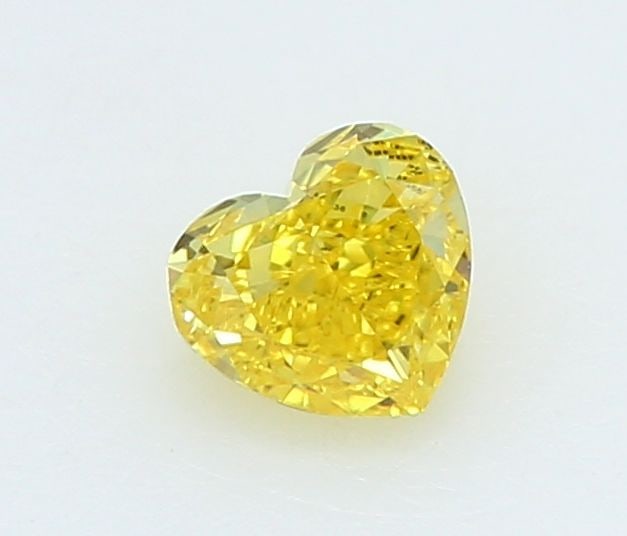 Loose Diamond - HEART 0.19ct Fancy Vivid Yellow VVS1: Loose Diamond - HEART 0.19ct Fancy Vivid Yellow VVS1 Source: This is a real non-mined Diamond that has been grown in a lab Shape: HEART Carats: 0.19 Color: Fancy Vivid Yellow Certification: IGI Video: