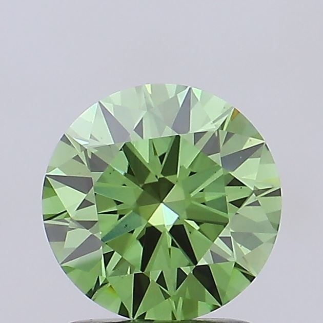 Ideal Loose Diamond - ROUND 1.54ct Fancy Vivid Green VS1: Ideal Loose Diamond - ROUND 1.54ct Fancy Vivid Green VS1 Source: This is a real non-mined Diamond that has been grown in a lab Shape: ROUND Carats: 1.54 Color: Fancy Vivid Green Certification: IGI Vid