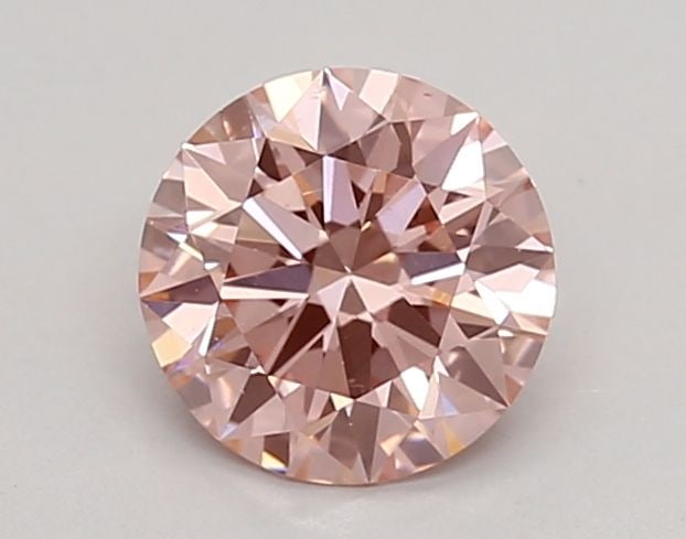 Loose Diamond - ROUND 0.79ct Fancy Intense Pink VS1: Loose Diamond - ROUND 0.79ct Fancy Intense Pink VS1 Source: This is a real non-mined Diamond that has been grown in a lab Shape: ROUND Carats: 0.79 Color: Fancy Intense Pink Certification: IGI Video: