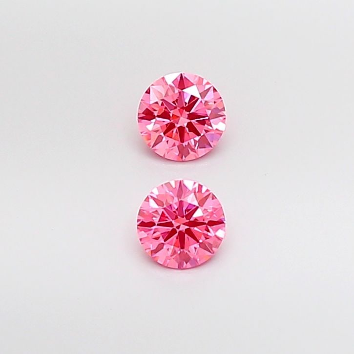 Ideal Loose Diamond - ROUND 0.52ct Fancy Vivid Pink VS2: Ideal Loose Diamond - ROUND 0.52ct Fancy Vivid Pink VS2 Source: This is a real non-mined Diamond that has been grown in a lab Shape: ROUND Carats: 0.52 Color: Fancy Vivid Pink Certification: IGI Video