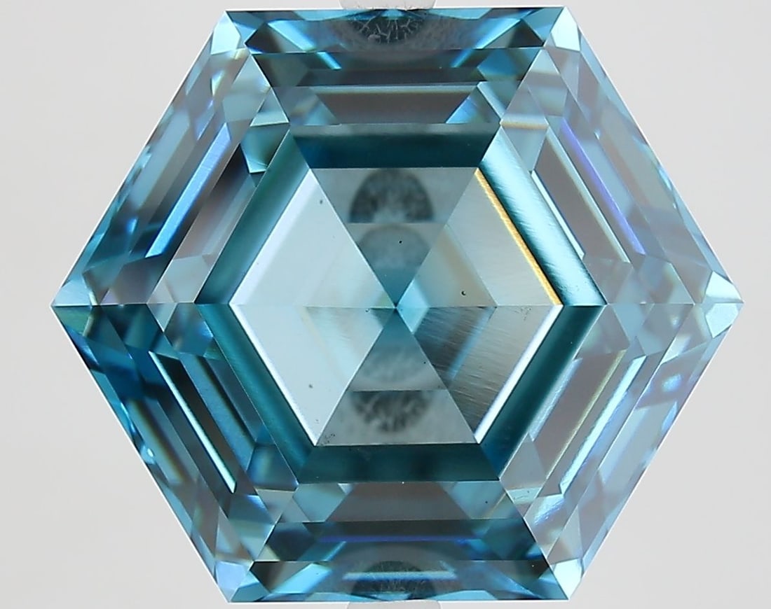 Loose Diamond - HEXAGONAL 11.83ct Fancy Vivid Blue VS1: Loose Diamond - HEXAGONAL 11.83ct Fancy Vivid Blue VS1 Source: This is a real non-mined Diamond that has been grown in a lab Shape: HEXAGONAL Carats: 11.83 Color: Fancy Vivid Blue Certification: IGI V
