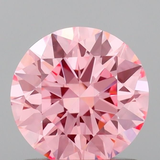 Ideal Loose Diamond - ROUND 0.93ct Fancy Vivid Pink VS1: Ideal Loose Diamond - ROUND 0.93ct Fancy Vivid Pink VS1 Source: This is a real non-mined Diamond that has been grown in a lab Shape: ROUND Carats: 0.93 Color: Fancy Vivid Pink Certification: IGI Video