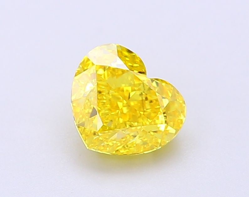 Loose Diamond - HEART 1.13ct Fancy Vivid Yellow VS1: Loose Diamond - HEART 1.13ct Fancy Vivid Yellow VS1 Source: This is a real non-mined Diamond that has been grown in a lab Shape: HEART Carats: 1.13 Color: Fancy Vivid Yellow Certification: IGI Video: