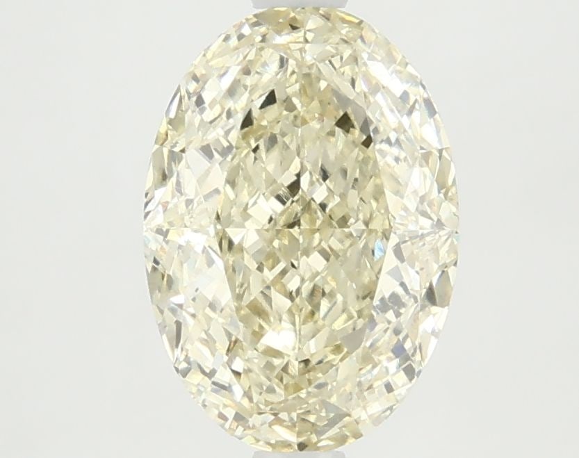 Loose Diamond - OVAL 2.74ct Fancy Yellow VS1: Loose Diamond - OVAL 2.74ct Fancy Yellow VS1 Source: This is a real non-mined Diamond that has been grown in a lab Shape: OVAL Carats: 2.74 Color: Fancy Yellow Certification: IGI Video: