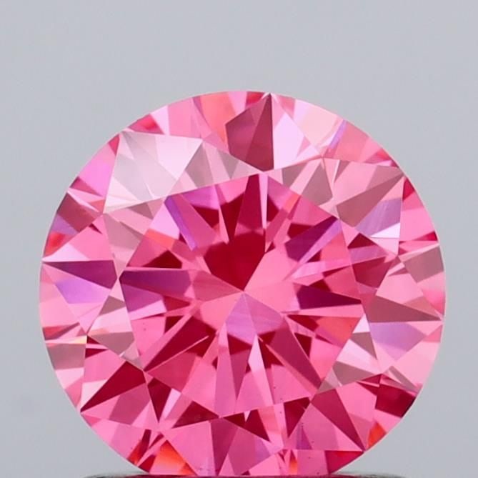 Loose Diamond - ROUND 1.01ct Fancy Vivid Pink VS1: Loose Diamond - ROUND 1.01ct Fancy Vivid Pink VS1 Source: This is a real non-mined Diamond that has been grown in a lab Shape: ROUND Carats: 1.01 Color: Fancy Vivid Pink Certification: IGI Video: