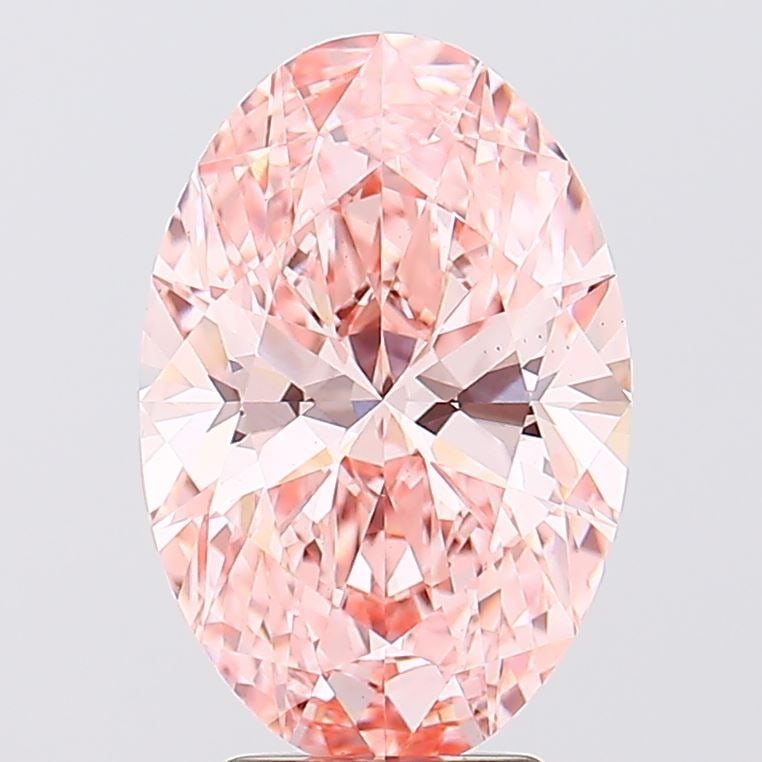 Loose Diamond - OVAL 4.15ct Fancy Vivid Pink VS1: Loose Diamond - OVAL 4.15ct Fancy Vivid Pink VS1 Source: This is a real non-mined Diamond that has been grown in a lab Shape: OVAL Carats: 4.15 Color: Fancy Vivid Pink Certification: IGI Video: