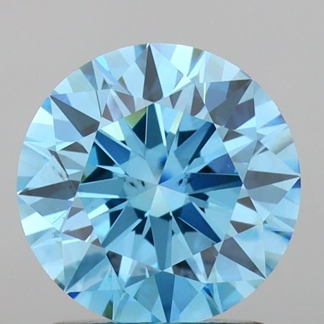 Ideal Loose Diamond - ROUND 2.03ct Fancy Vivid Blue VS2: Ideal Loose Diamond - ROUND 2.03ct Fancy Vivid Blue VS2 Source: This is a real non-mined Diamond that has been grown in a lab Shape: ROUND Carats: 2.03 Color: Fancy Vivid Blue Certification: IGI Video