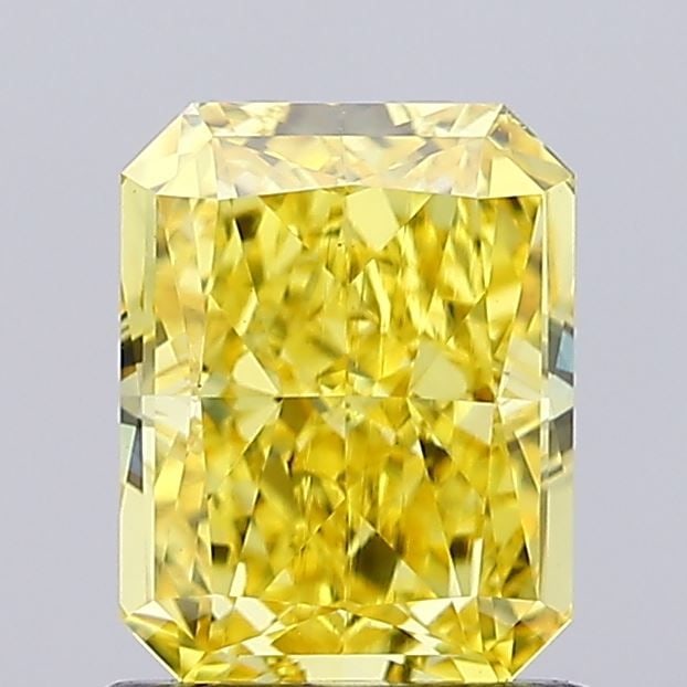 Loose Diamond - RADIANT 1.28ct Fancy Vivid Yellow VS1: Loose Diamond - RADIANT 1.28ct Fancy Vivid Yellow VS1 Source: This is a real non-mined Diamond that has been grown in a lab Shape: RADIANT Carats: 1.28 Color: Fancy Vivid Yellow Certification: IGI Vid