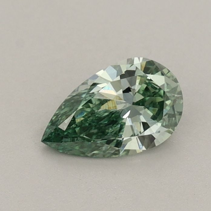 Loose Diamond - PEAR 0.43ct Fancy Vivid Green VVS2: Loose Diamond - PEAR 0.43ct Fancy Vivid Green VVS2 Source: This is a real non-mined Diamond that has been grown in a lab Shape: PEAR Carats: 0.43 Color: Fancy Vivid Green Certification: IGI Video: