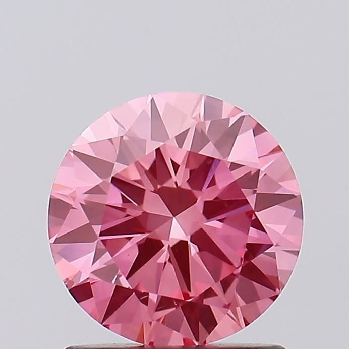 Loose Diamond - ROUND 1.12ct Fancy Pink VS2: Loose Diamond - ROUND 1.12ct Fancy Pink VS2 Source: This is a real non-mined Diamond that has been grown in a lab Shape: ROUND Carats: 1.12 Color: Fancy Pink Certification: IGI Video: