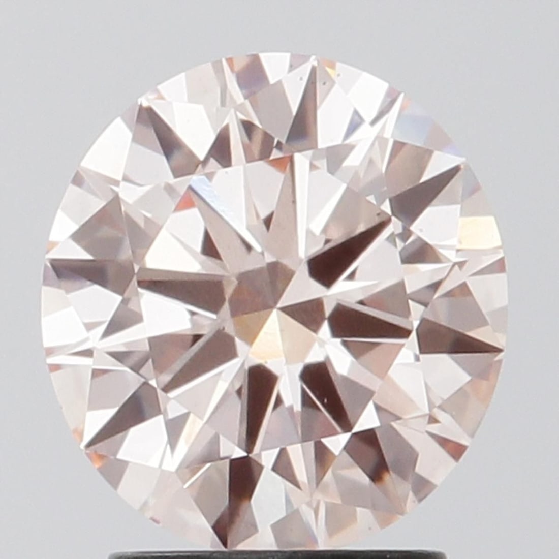 Loose Diamond - ROUND 2.01ct Fancy Pink VS1: Loose Diamond - ROUND 2.01ct Fancy Pink VS1 Source: This is a real non-mined Diamond that has been grown in a lab Shape: ROUND Carats: 2.01 Color: Fancy Pink Certification: IGI Video:
