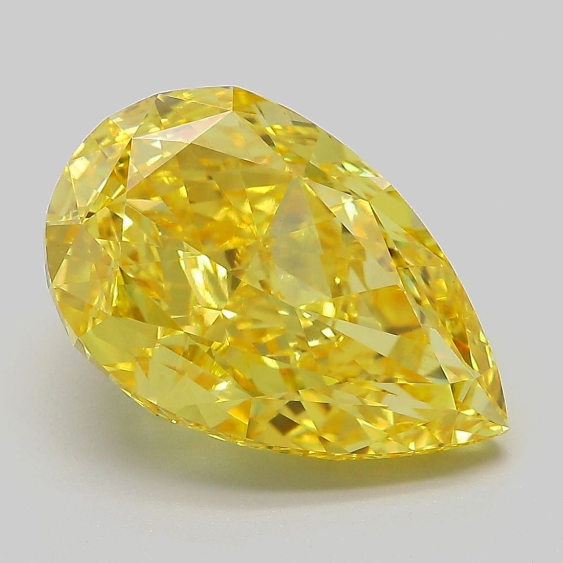 Loose Diamond - PEAR 7.06ct Fancy Vivid Yellow VS1: Loose Diamond - PEAR 7.06ct Fancy Vivid Yellow VS1 Source: This is a real non-mined Diamond that has been grown in a lab Shape: PEAR Carats: 7.06 Color: Fancy Vivid Yellow Certification: IGI Video: