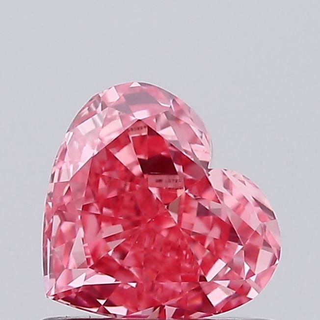 Loose Diamond - HEART 0.74ct Fancy Vivid Pink VS1: Loose Diamond - HEART 0.74ct Fancy Vivid Pink VS1 Source: This is a real non-mined Diamond that has been grown in a lab Shape: HEART Carats: 0.74 Color: Fancy Vivid Pink Certification: IGI Video: