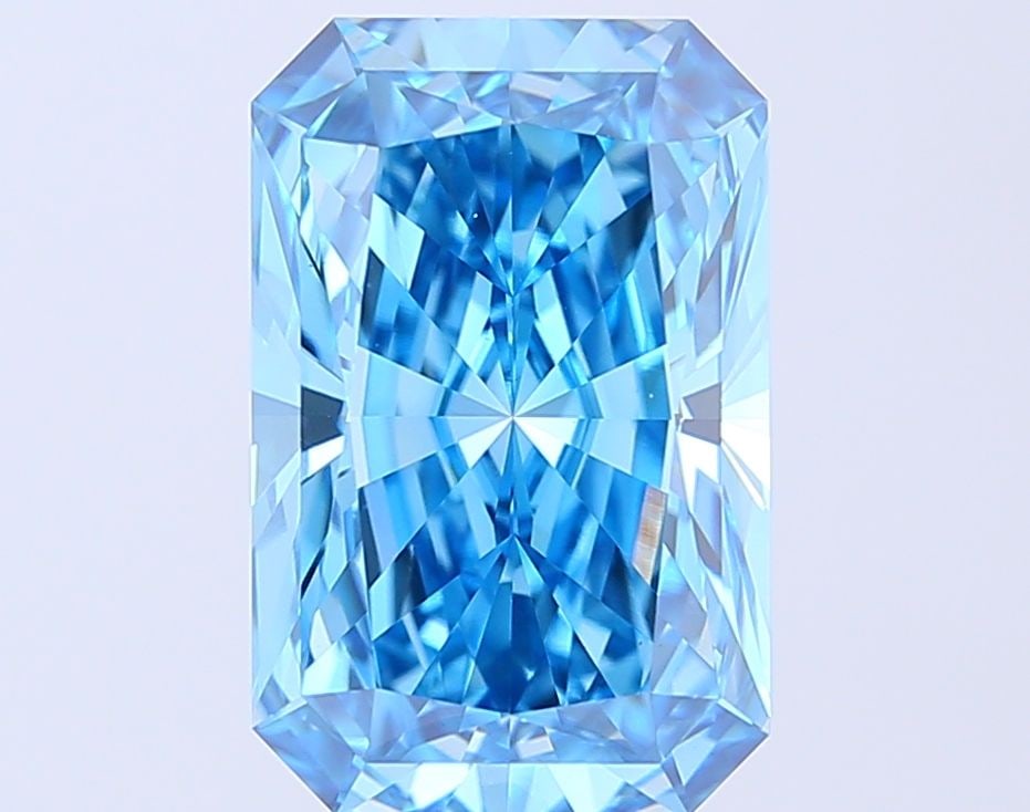Loose Diamond - RADIANT 5.32ct Fancy Vivid Blue VVS2: Loose Diamond - RADIANT 5.32ct Fancy Vivid Blue VVS2 Source: This is a real non-mined Diamond that has been grown in a lab Shape: RADIANT Carats: 5.32 Color: Fancy Vivid Blue Certification: IGI Video: