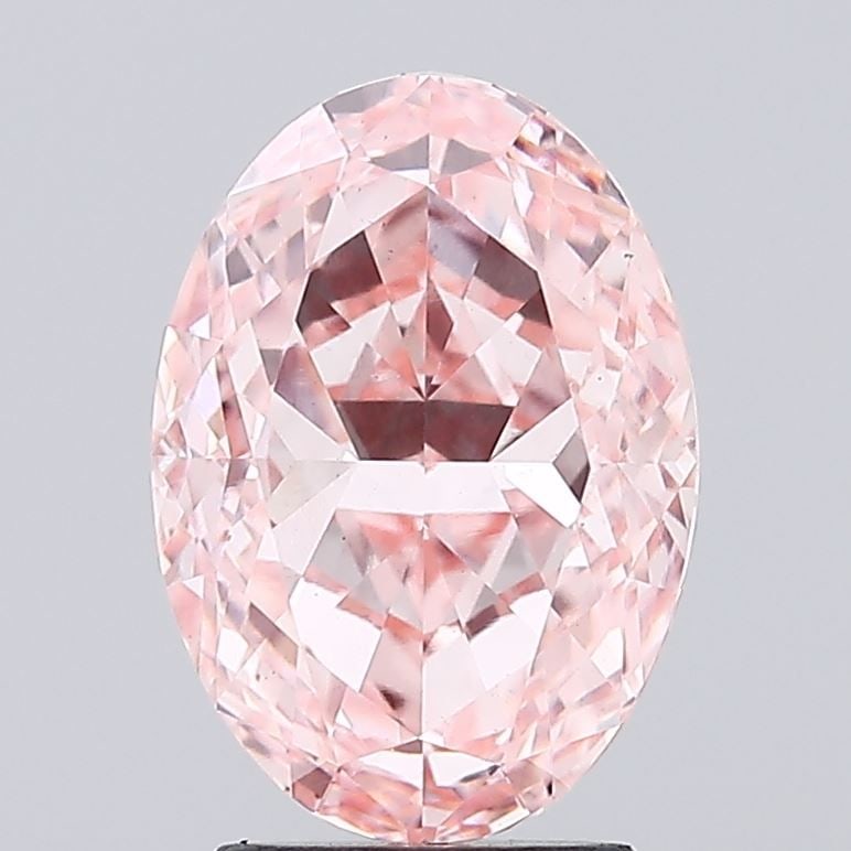 Loose Diamond - OVAL 3.3ct Fancy Vivid Pink VS1: Loose Diamond - OVAL 3.3ct Fancy Vivid Pink VS1 Source: This is a real non-mined Diamond that has been grown in a lab Shape: OVAL Carats: 3.3 Color: Fancy Vivid Pink Certification: IGI Video: