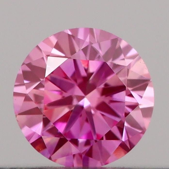 Loose Diamond - ROUND 0.19ct Fancy Vivid Pink VVS2: Loose Diamond - ROUND 0.19ct Fancy Vivid Pink VVS2 Source: This is a real non-mined Diamond that has been grown in a lab Shape: ROUND Carats: 0.19 Color: Fancy Vivid Pink Certification: IGI Video: