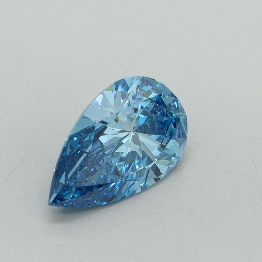 Loose Diamond - PEAR 1.19ct Fancy Vivid Blue VS1: Loose Diamond - PEAR 1.19ct Fancy Vivid Blue VS1 Source: This is a real non-mined Diamond that has been grown in a lab Shape: PEAR Carats: 1.19 Color: Fancy Vivid Blue Certification: IGI Video: